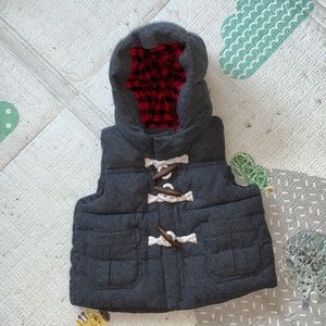 Baby Gap puffy vest with toggles.